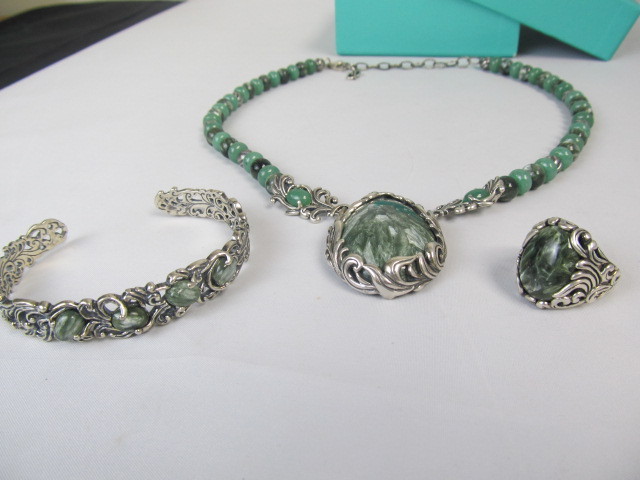 lot 187 image: Sterling Silver Smoky Green Stone Pendant Necklace Bracelet & Ring