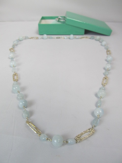lot 195 image: Sterling Silver Filigree & Pale Blue Stone Necklace