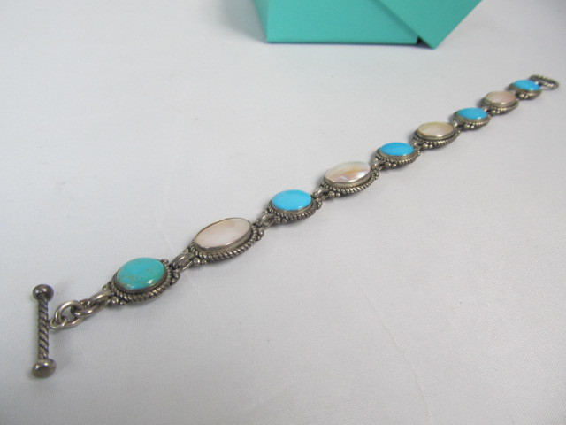 lot 199 image: Sterling Silver Purity Promise  Good Fortune Turquoise & Mother Of Pearl Bracelet