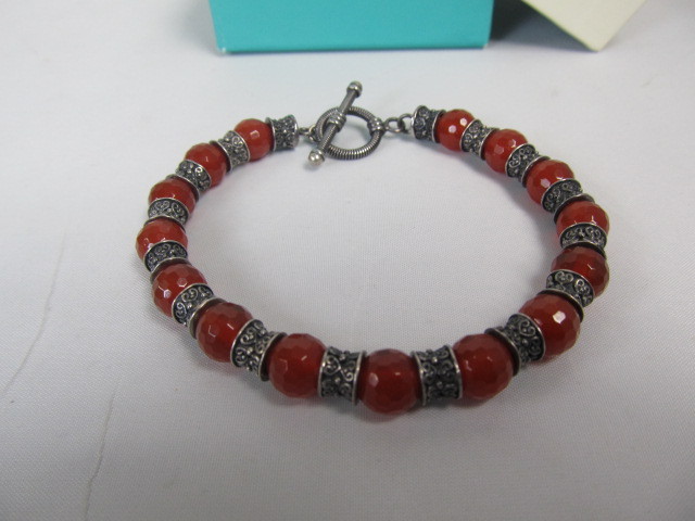 lot 211 image: Sterling Silver & Cut Red Gemstone Bracelet