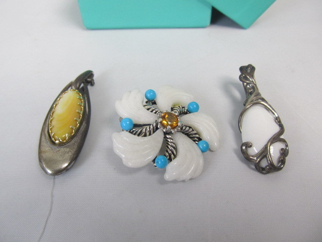 lot 214 image: 3 Different Sterling Silver Pendants