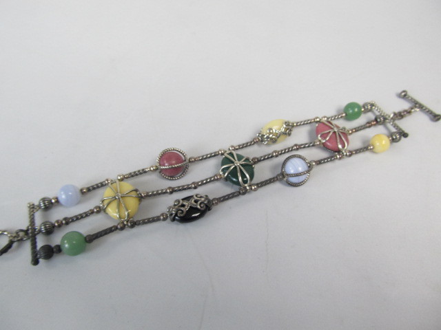 lot 225 image: Sterling Silver 3-Banded Multi Gemstone Bracelet