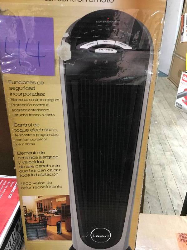 Lasko Products Ceramic Tower Heater with Remote in working conditions