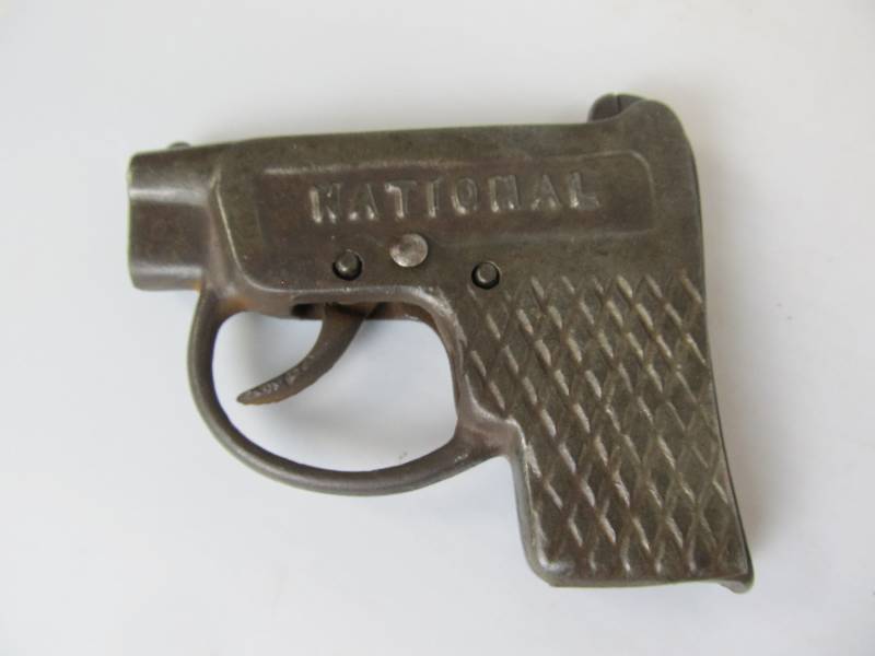 lot 16 image: Vintage NATIONAL Cast Iron Cap Gun