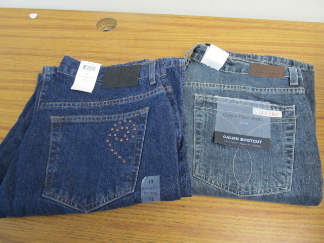lot 145 image: 2 Pairs of BRAND NEW Womens Calvin Klein Jeans - Size 12
