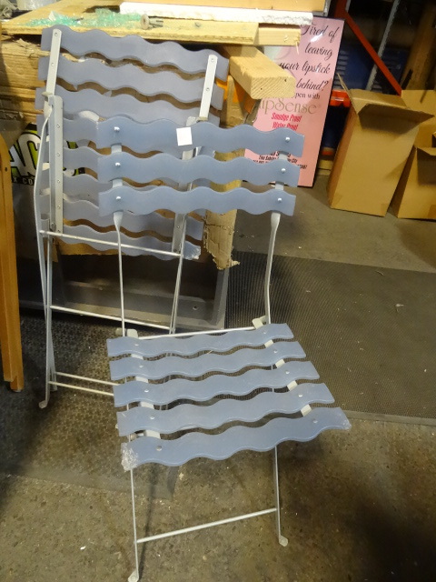 2 matching folding chairs...