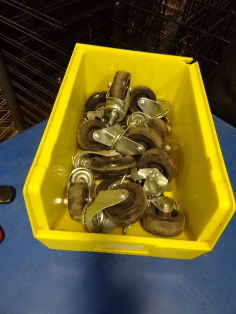 Hardware bin with misc casters...