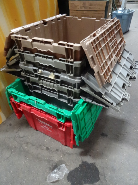 7 plastic storage totes. 2 sizes...