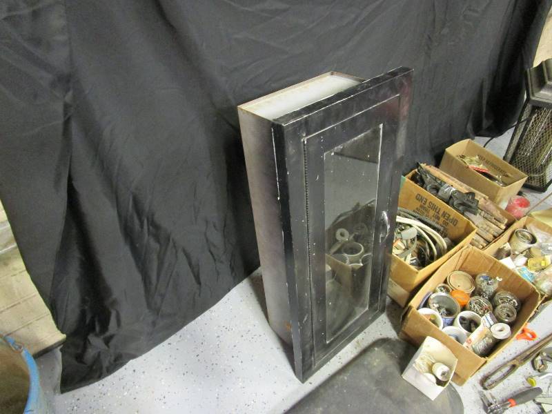lot 34 image: Bug Zapper, Fan, Fire Extinguisher Cab & Misc. Hardware