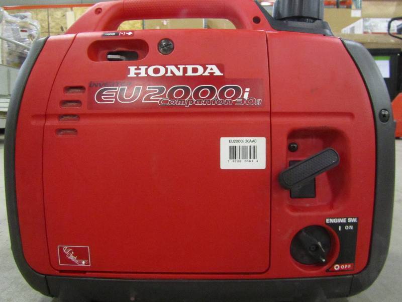 lot 7 image: Honda 2,000-Watt Super Quiet Gasoline Powered Portable Inverter Generator with Eco-Throttle and Oil Alert