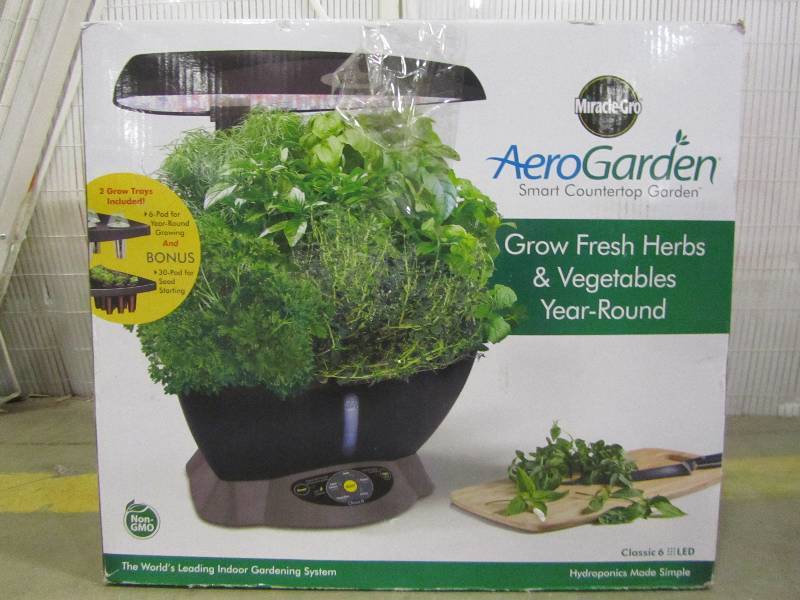 lot 81 image: Miracle-Gro AeroGarden Classic 6 Smart Garden plus BONUS Seed Starting System