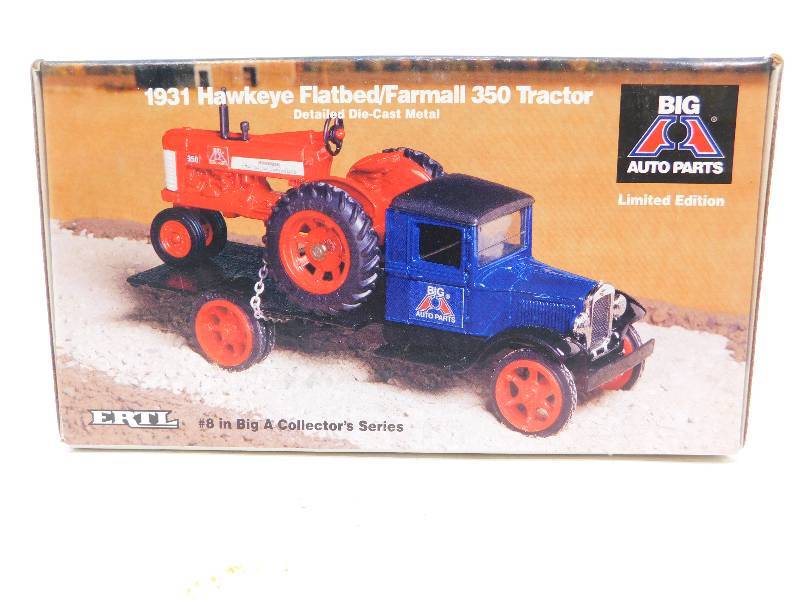 lot 74 image: Ertl 1931 Hawkeye FlatbedFarmall 350 Tractor