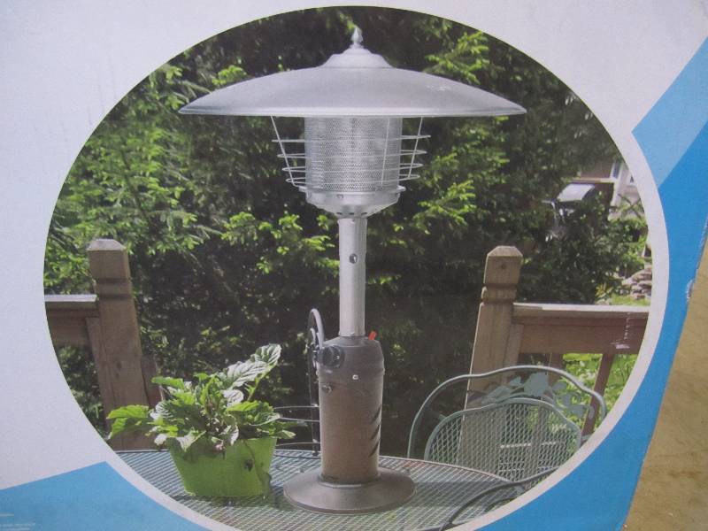 lot 9 image: Table Top Patio Heater Open Box Ret...