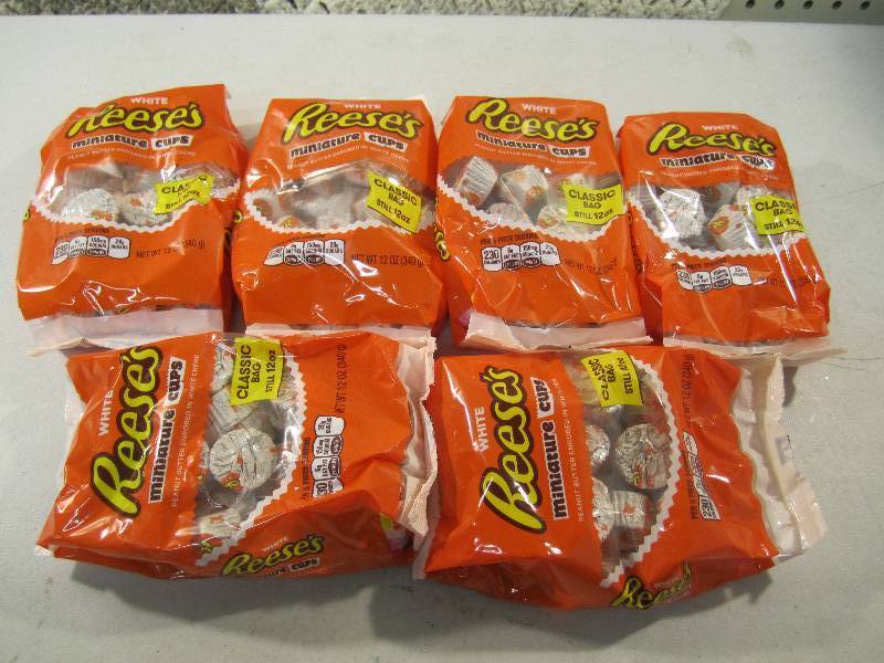lot 117 image: Lot of 6 Bags White Reeses Miniatur...