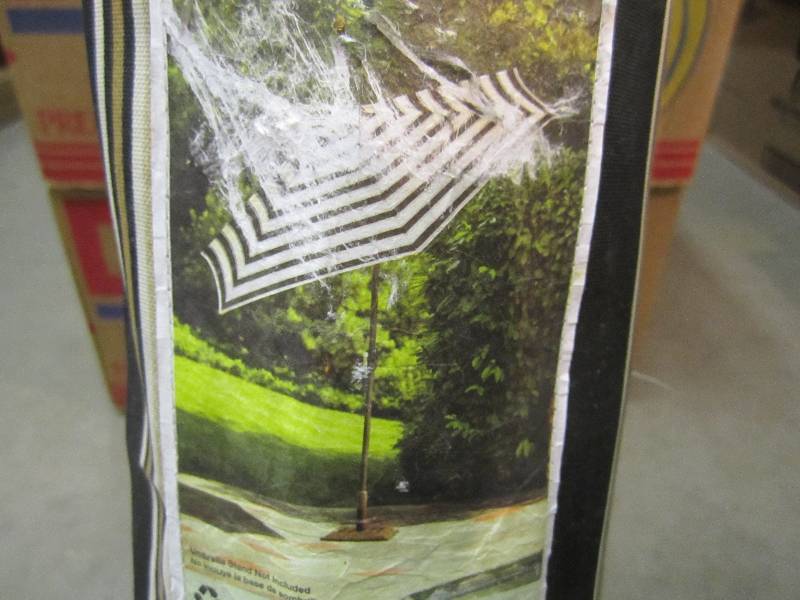 lot 182 image: Hampton Bay 9 ft Tilting Patio Umbr...