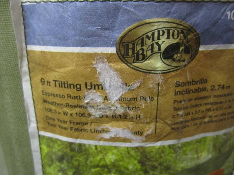 lot 186 image: Hampton Bay 9 ft Tilting Patio Umbr...