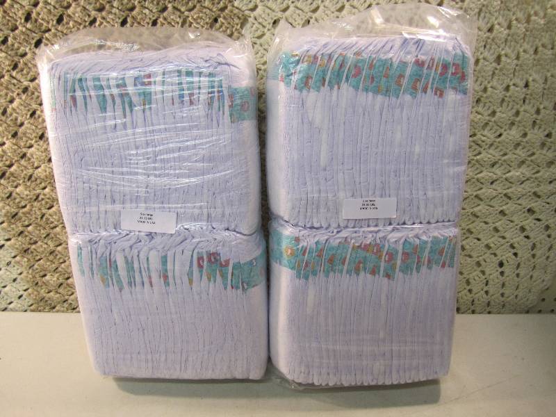 lot 281 image: Lot of 100 Size Large Diapers 2 pac...