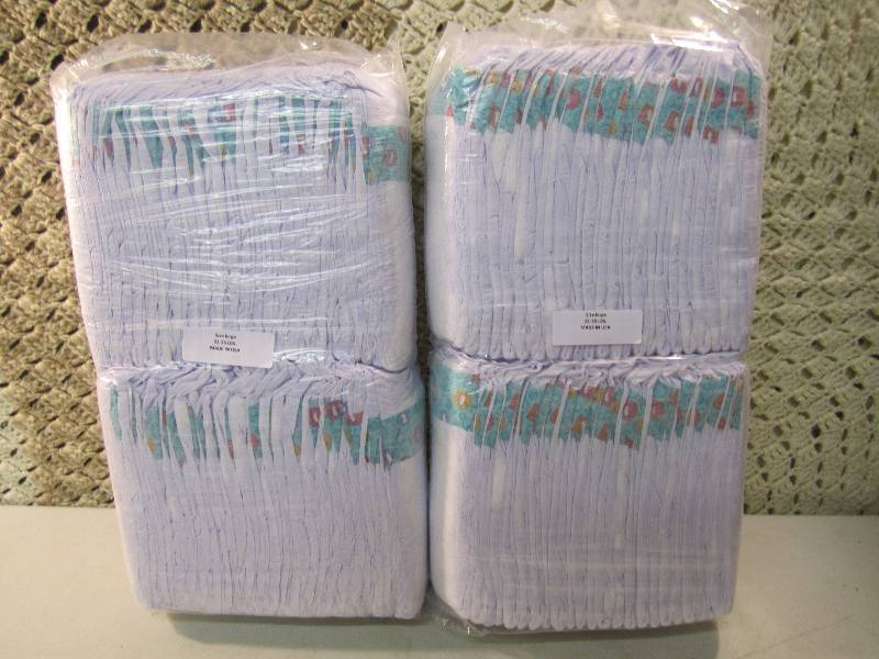 lot 284 image: Lot of 100 Size Large Diapers 2 pac...