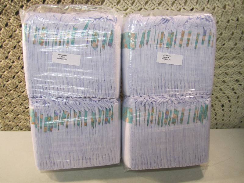 lot 286 image: Lot of 100 Size Medium Diapers 2 pa...