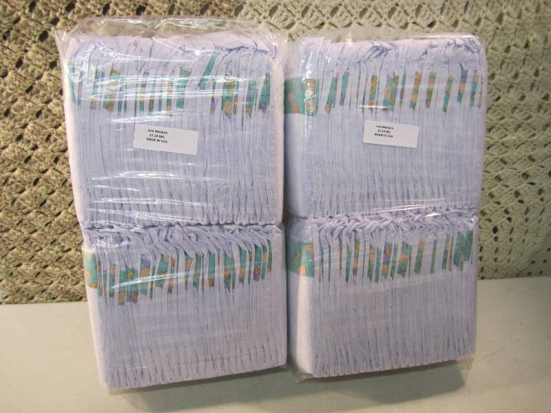 lot 287 image: Lot of 100 Size Medium Diapers 2 pa...