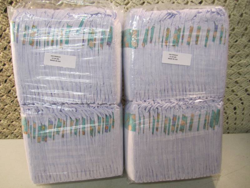 lot 288 image: Lot of 100 Size Medium Diapers 2 pa...