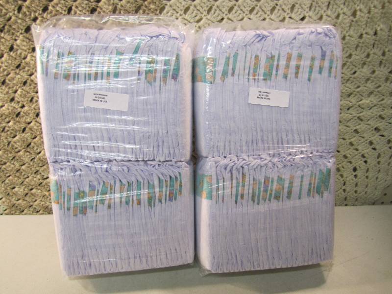 lot 289 image: Lot of 100 Size Medium Diapers 2 pa...