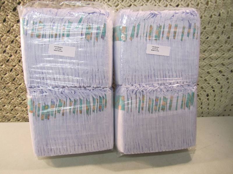 lot 290 image: Lot of 100 Size Medium Diapers 2 pa...