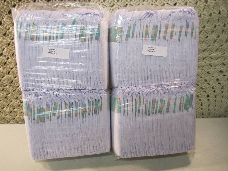 lot 291 image: Lot of 100 Size Medium Diapers 2 pa...