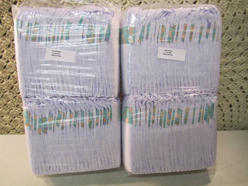 lot 293 image: Lot of 100 Size Medium Diapers 2 pa...