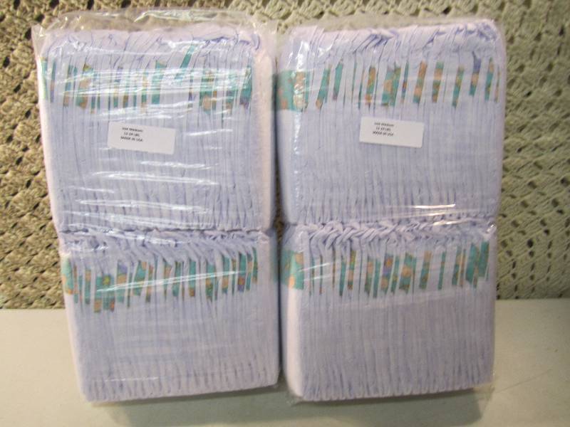 lot 294 image: Lot of 100 Size Medium Diapers 2 pa...