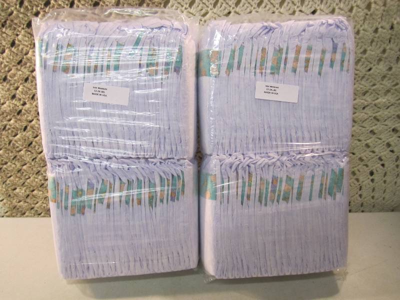 lot 296 image: Lot of 100 Size Medium Diapers 2 pa...