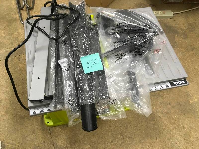 lot 50 image: Ryobi 10 Table Saw with Steel Stand -in working conditions
