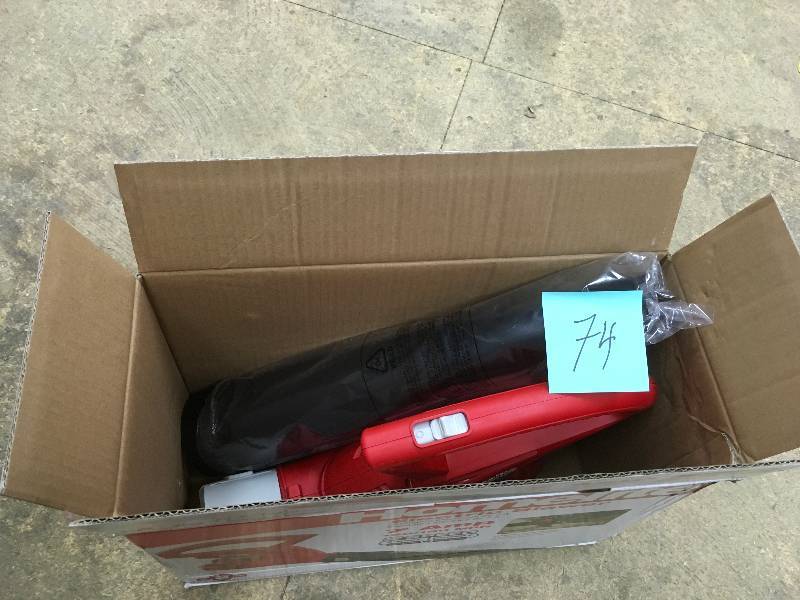 lot 74 image: Homelite Electric Blower 7 Amp open box never used