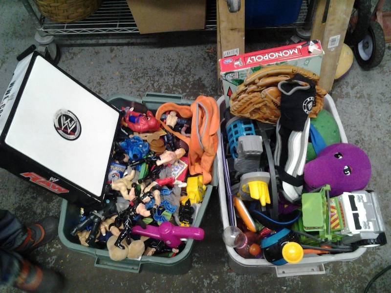 lot 37 image: 2-Totes FULL Of Toys, Games, Action Figures, Bike Helmets, More