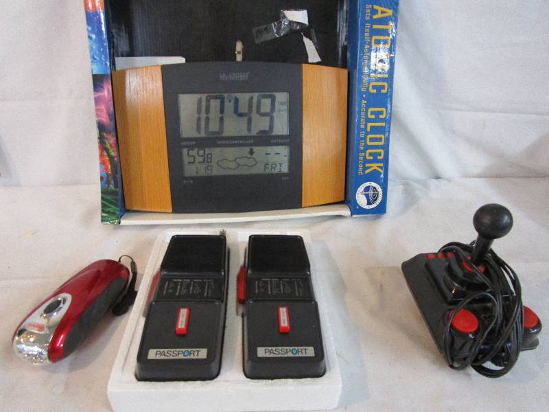 lot 60 image: Atomic ClockJoy Stick Walkie Talkies and Flash light