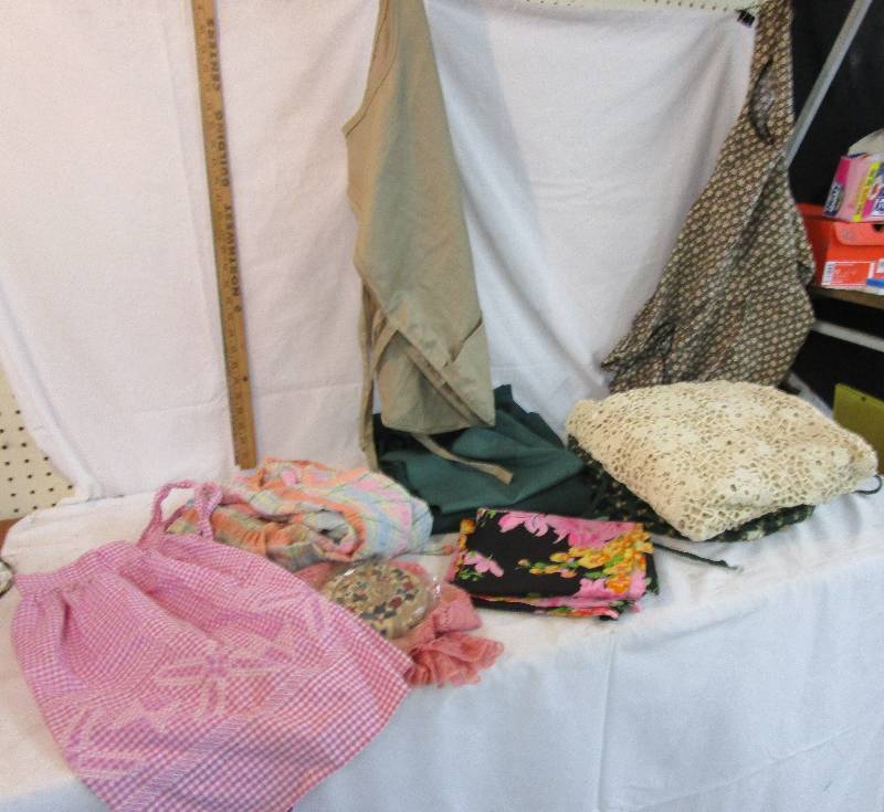 lot 109 image: Aprons, Beautiful Lace table clothes and chair cushions