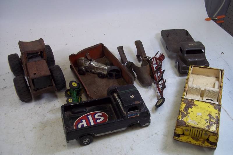 lot 108 image: Assorted Farm Equipment toys and toy trucks