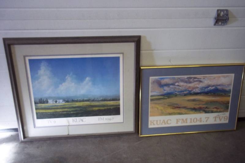 lot 237 image: Pair of Art Framed Prints Kuac 104.7 TV9 Radio by Lisa Valore 23x25 and 16x23