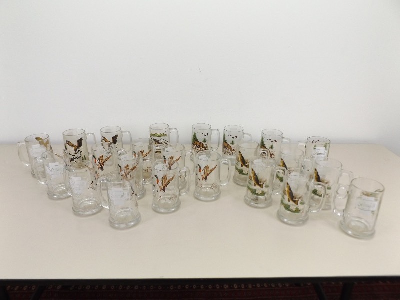 lot 15 image: 23 Schmidt Beer Collector Series Glass Mugs