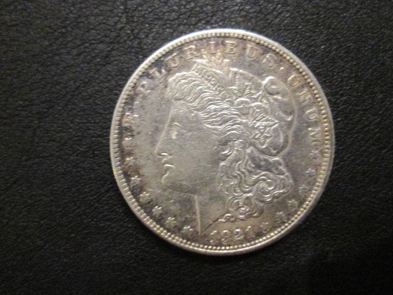 lot 8 image: 1921 Morgan Dollar...
