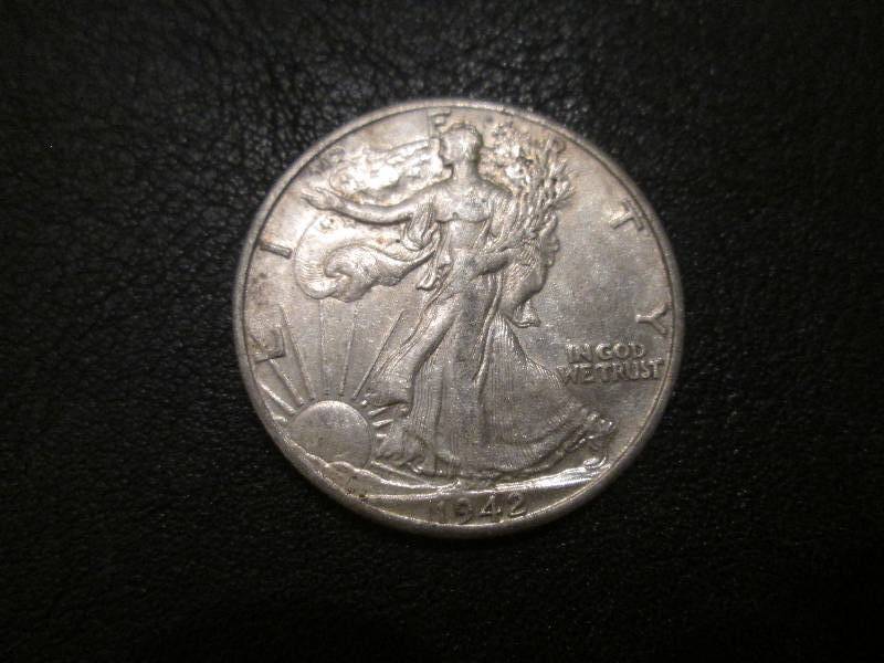 lot 26 image: 1942 Half Dollar...
