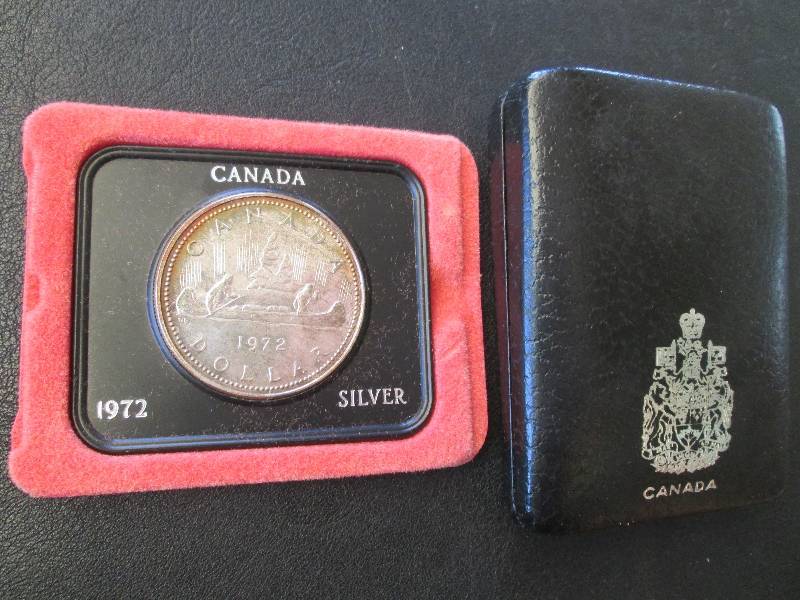 lot 67 image: 1972 Canada silver dollar...