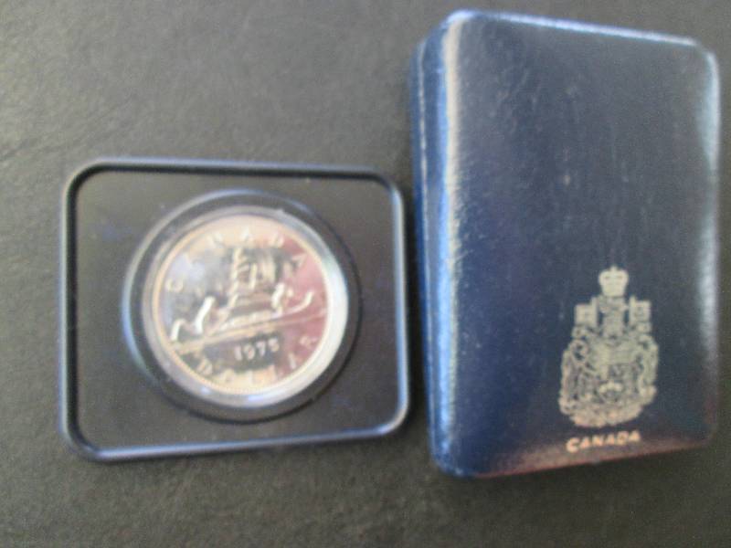 lot 72 image: 1975 Canada dollar...
