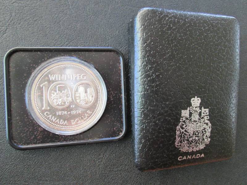 lot 73 image: Winnipeg 1874 - 1974 Canada dollar...