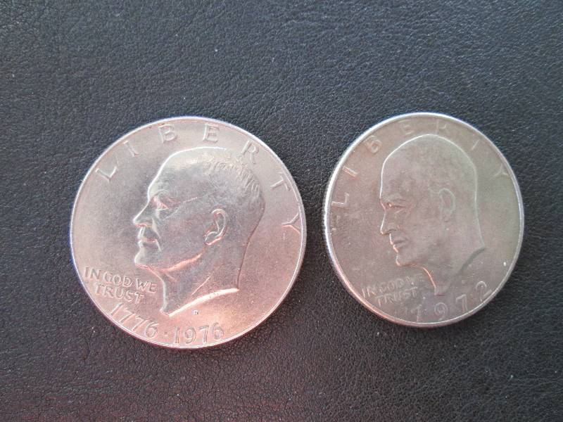 lot 99 image: 1972 and 1976 Dollar...