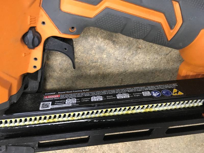 lot 28 image: Ridgid 21 Degree 3-12 in. Round Head Framing Nailer  open box not used