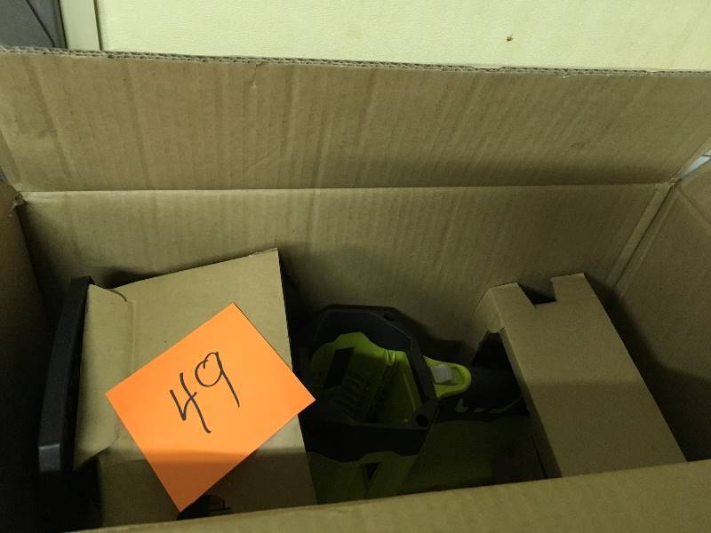 lot 49 image: Ryobi 14 in. 40-Volt Brushless Lithium-Ion Cordless Chainsaw Battery and Charger NOT included in like new condition
