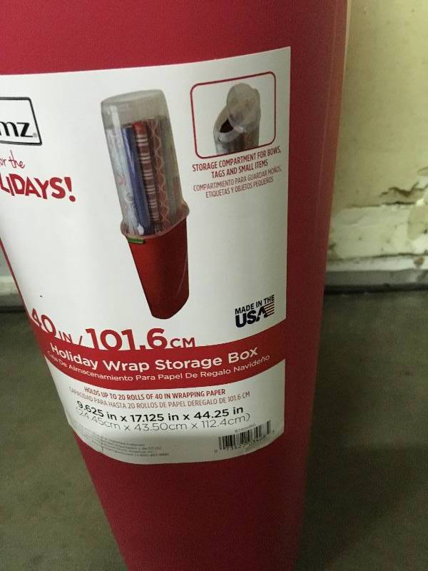 lot 63 image: Homz Holiday Storage 40 Vertical Wrap Storage  open box not used