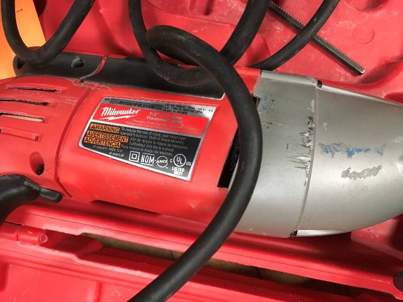 lot 96 image: Milwaukee 12 Hammer Drill used in good working condition