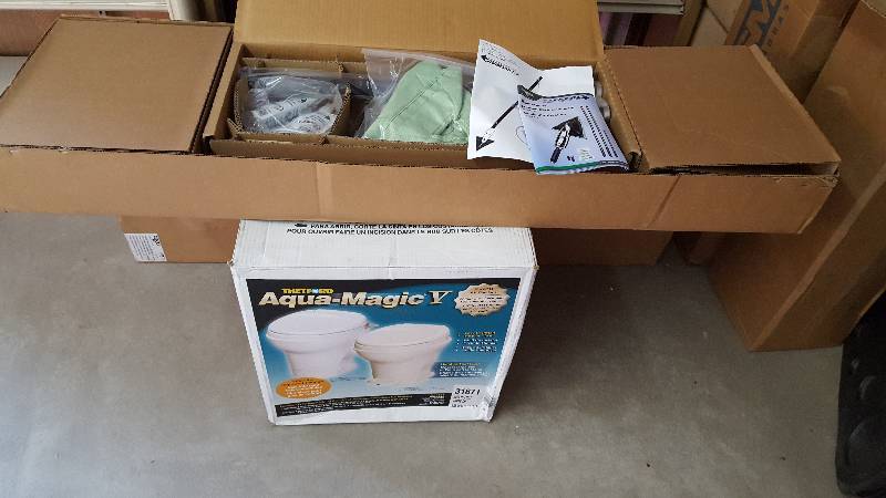 lot 77 image: RV Toilet & Stingray Glass Cleaning System